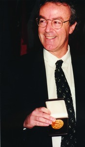 Simon Chapman receiving his World Health Organization medal, Copyright held by image owner